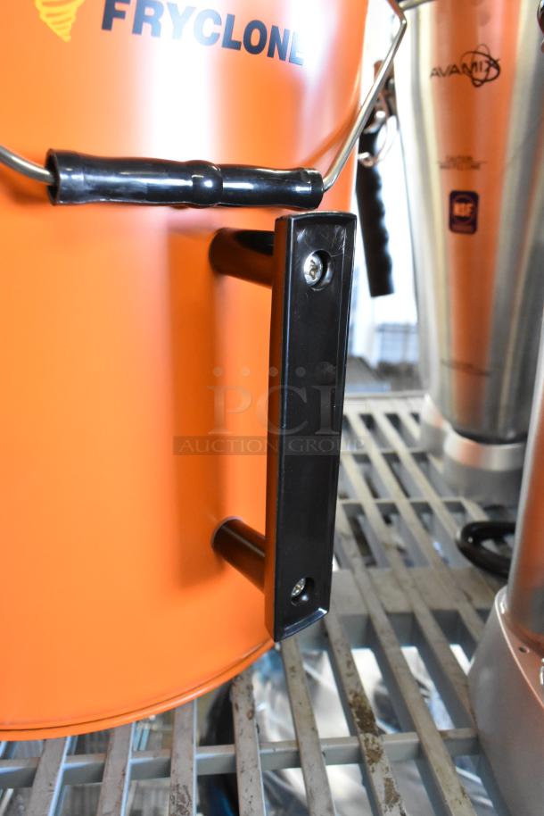 Brand new Fryclone 6.5 Gallon Orange Utility Oil Pail with minor scratches. Robust handle, model 259FOPN6GL.