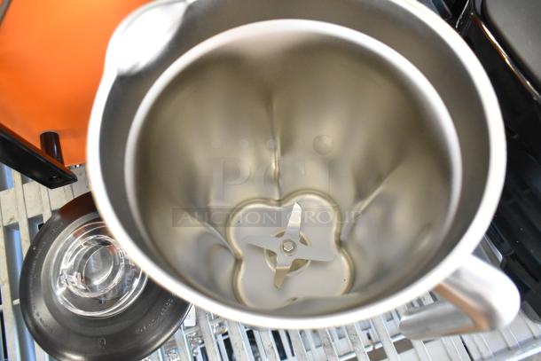 AvaMix stainless steel blender pitcher, new condition, includes blending blade, scratch and dent sale item.