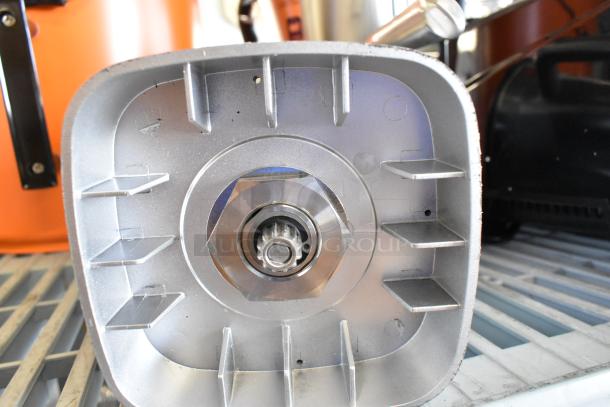 AvaMix stainless steel blender pitcher base, brand new, with visible metal blades and durable construction.