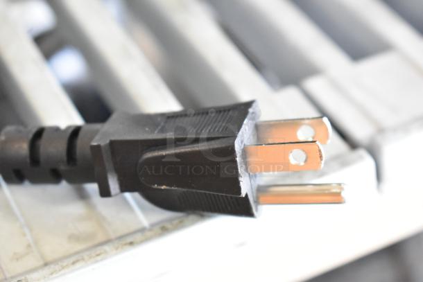 Close-up of a power plug attached to the BRAND NEW AvaMix 928BX1100E commercial blender, 120 volts, 1 phase.