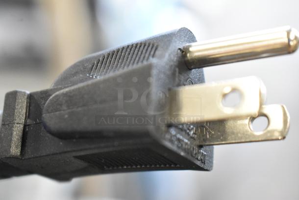 Close-up of a power plug for the BRAND NEW SCRATCH AND DENT! 2025 AvaMix 928BX2000V Blender, 120 Volts, 1 Phase.