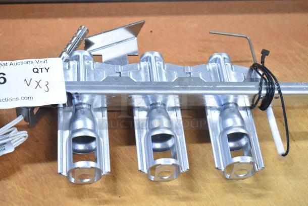 3 new Frymaster 1085996SP VIB Board Assembly burners, scratch and dent condition, with tags showing auction info.