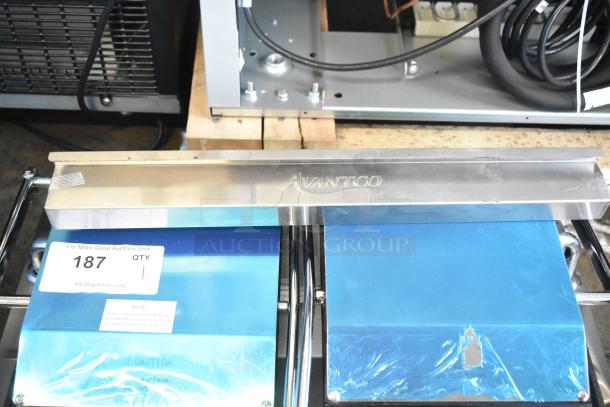 Brand new Avantco 177PG400ST dual panini grill, stainless steel, smooth plates, 19 5/8" x 9 1/8" surface. Item tag: 187.