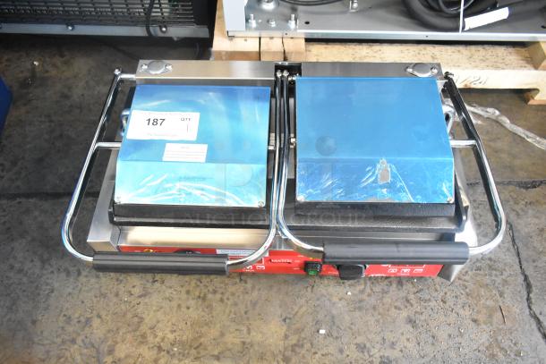 Avantco 177PG400ST dual panini grill, stainless steel, 19 5/8" x 9 1/8" smooth plates, timer, new scratch and dent condition.