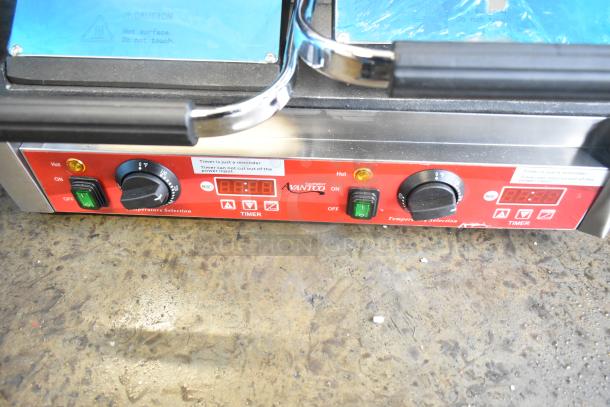 Brand new Avantco 177PG400ST dual panini grill, smooth plates, timer, 19 5/8"x9 1/8" cooking surface, 120V, scratch and dent condition.
