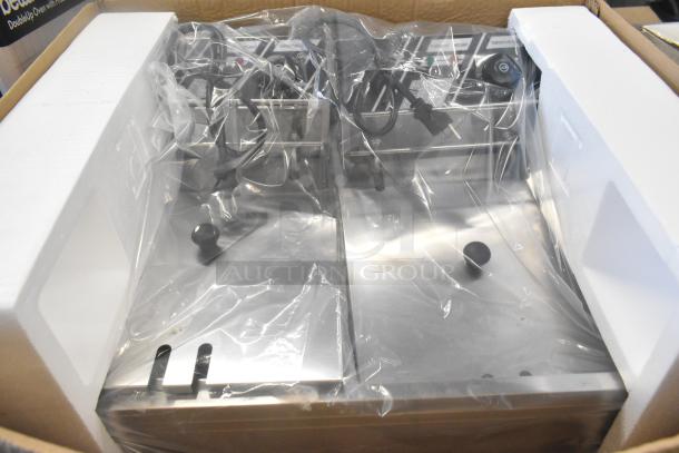 BRAND NEW KI02057 stainless steel 2-bay fryer, electric powered, countertop model, with protective packaging. Scratch and dent condition.