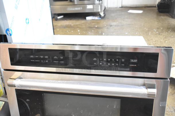 KoolMore KM-CWO30-SS 30" stainless steel built-in microwave with convection, new condition, minor scratches, control panel visible.