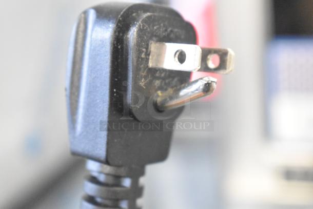 Alt Text: Close-up of a power plug for the Amana RCS10TS Commercial Microwave. 120 Volts, 1 Phase.