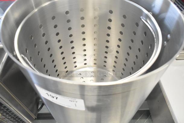 Choice 471GR60QT 60 Qt. aluminum stock pot with steam insert, perforated design, standard weight, new condition.