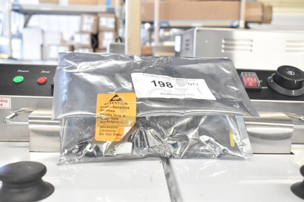 Alt text: Sealed circuit board in anti-static bag, labeled as static-sensitive. Auction tag reads "198 QTY."