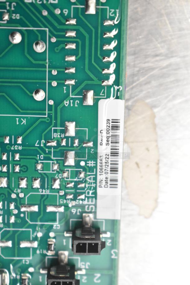 Circuit board with visible components and pathways. Includes a label with P/N: 1066663, Rev: D, Date: 07/25/22, Seq: 00239.
