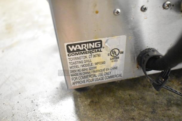 Waring WFG300 Stainless Steel Panini Press, 240V, UL Listed. Commercial use only, some wear visible.