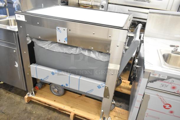 BRAND NEW SCRATCH AND DENT Follett LQ1BASE stainless steel ice machine stand with poly ice bin, visible protective film.