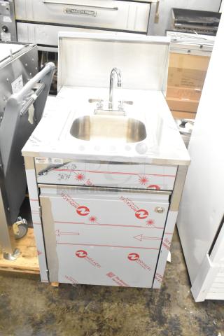 Brand new QualServ stainless steel portable sink, scratch and dent condition, on commercial casters, 120V, 1 Phase.