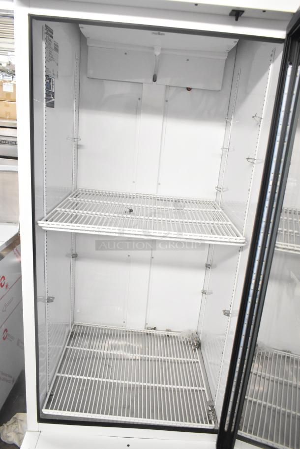 2021 True TSCI-600R-G-PH commercial cooler with single glass door, poly-coated racks, and metal construction. Excellent condition.