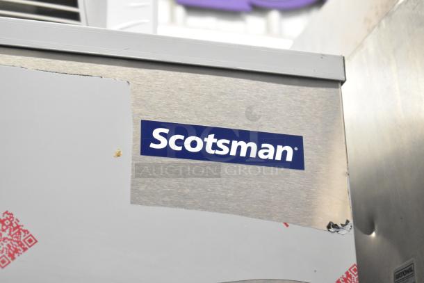 BRAND NEW Scotsman FS1222A-32B ice head on ICS730-A bin with minor scratches; stainless steel finish; includes ice cart.