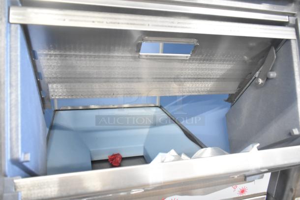 Brand new 2024 Scotsman FS1222A-32B stainless steel ice head on 2025 Scotsman ICS730-A bin, with Follett stand and gray portable cart.