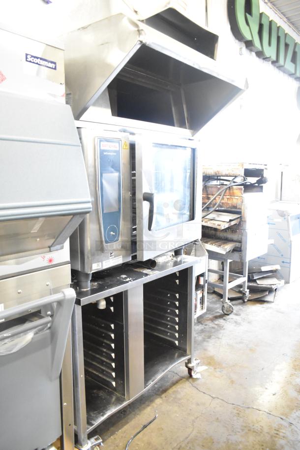 2019 Rational SCC WE 62 Combi Convection Oven with UltraVent Hood on a double pan rack. Door does not stay closed, 480V, 3-phase.