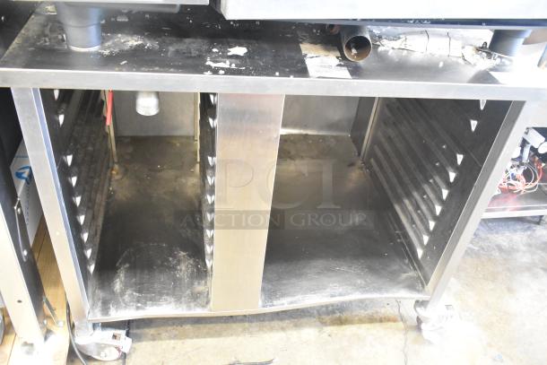 2019 Rational SCC WE 62 combi oven with UltraVent Plus hood, on double pan rack stand. Door issue; 480V, 3 phase.