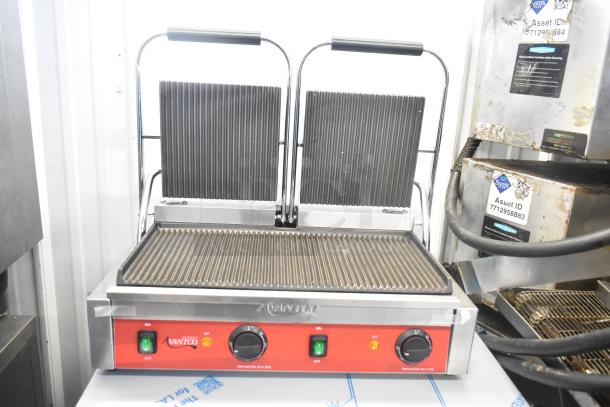 Brand new Avantco 177PG400 stainless steel dual panini grill, grooved plates, 19 5/8" x 9 1/8" surface, 120V.