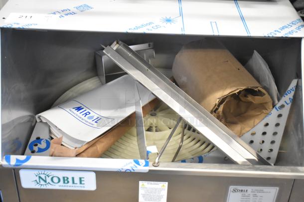 Brand new 2025 Noble WAREFORCE CG-115 stainless steel commercial glass washer. Carousel type, 115 volts, 1 phase, visible minor dents.