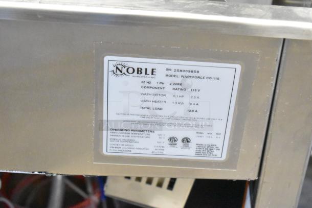 Brand new Noble WAREFORCE CG-115 glass washer, stainless steel, 115V, commercial use, label showing model and specs.