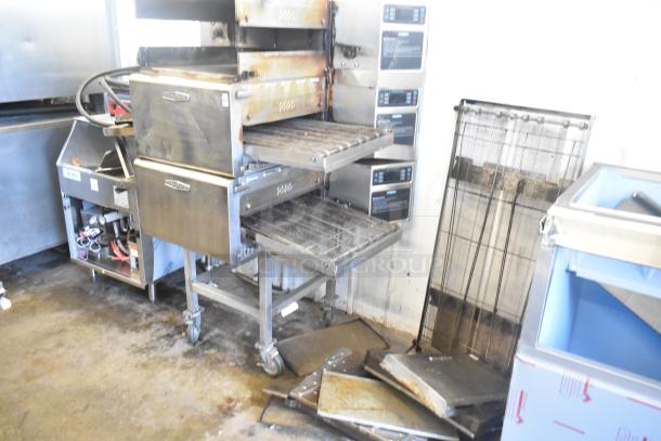 Three 2016 Turbochef HhC2020 stainless steel rapid cook conveyor ovens on casters, 208/240V, 3-phase. Includes parts shown.