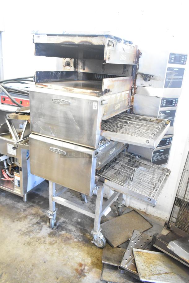Three 2016 Turbochef HhC2020 stainless steel conveyor ovens on casters, electric, 208/240V, 3-phase, with accessories.