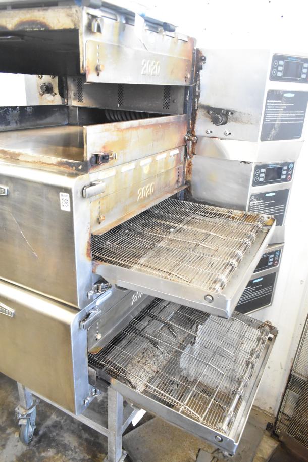 Turbochef HhC2020 stainless steel rapid cook conveyor oven, electric, 208/240V, visibly used, on commercial casters.
