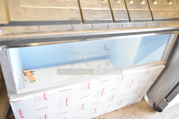 BRAND NEW Hoshizaki B-900SF stainless steel ice storage bin, 2022 model. 52" width, 900 lb capacity. Scratch and dent condition.