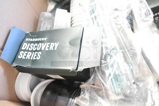 Lot of assorted items including Starbucks Discovery Series box, cups, lids, and wrapped straws in a box, various conditions.