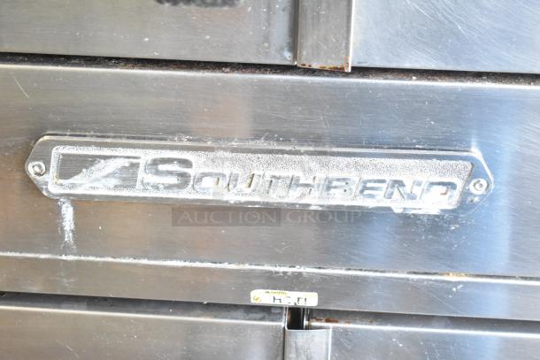 Southbend SL Series stainless steel convection oven, features view-through doors and thermostatic controls. Visible branding.
