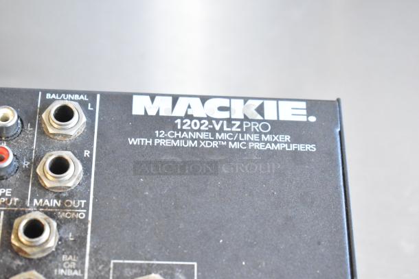 Mackie 1202-VLZ Pro 12 Channel Mixer with visible ports and label, featuring premium XDR mic preamplifiers.