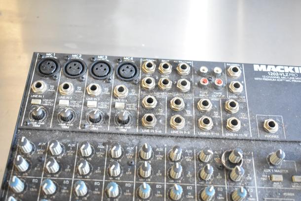 Mackie 1202-VLZ Pro mixer, 12-channel with mic and line inputs. Features balanced/unbalanced options. Slightly worn condition.