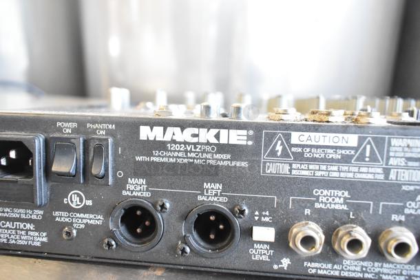 Mackie 1202-VLZ Pro 12-channel mixer, featuring premium XDR mic preamps, power and phantom switches, balanced main outputs.