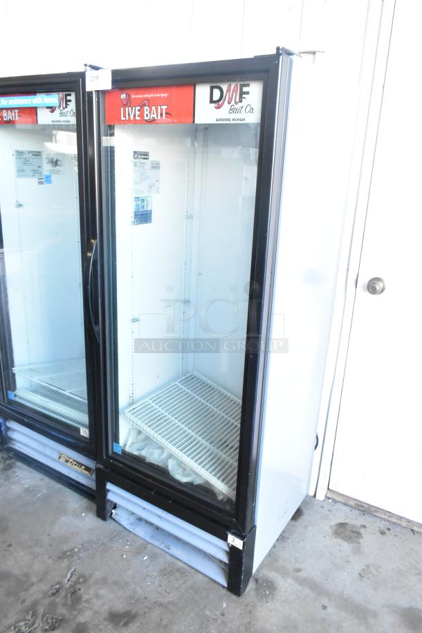 2021 True GDM-12-HC commercial single door cooler merchandiser, metal frame, visible interior shelving, 115V, 1 phase, DMF label.