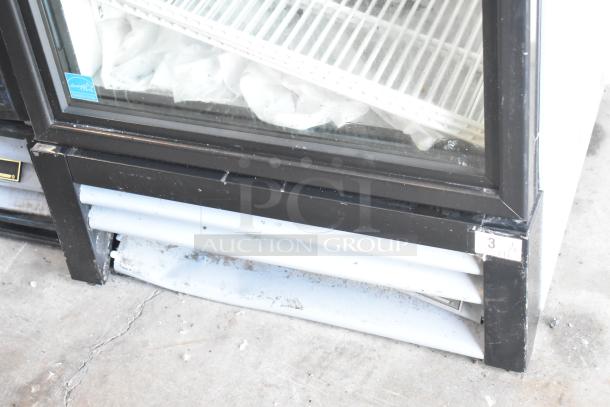 2021 True GDM-12-HC commercial cooler, single glass door, metal frame, Energy Star label, 115V, used condition.