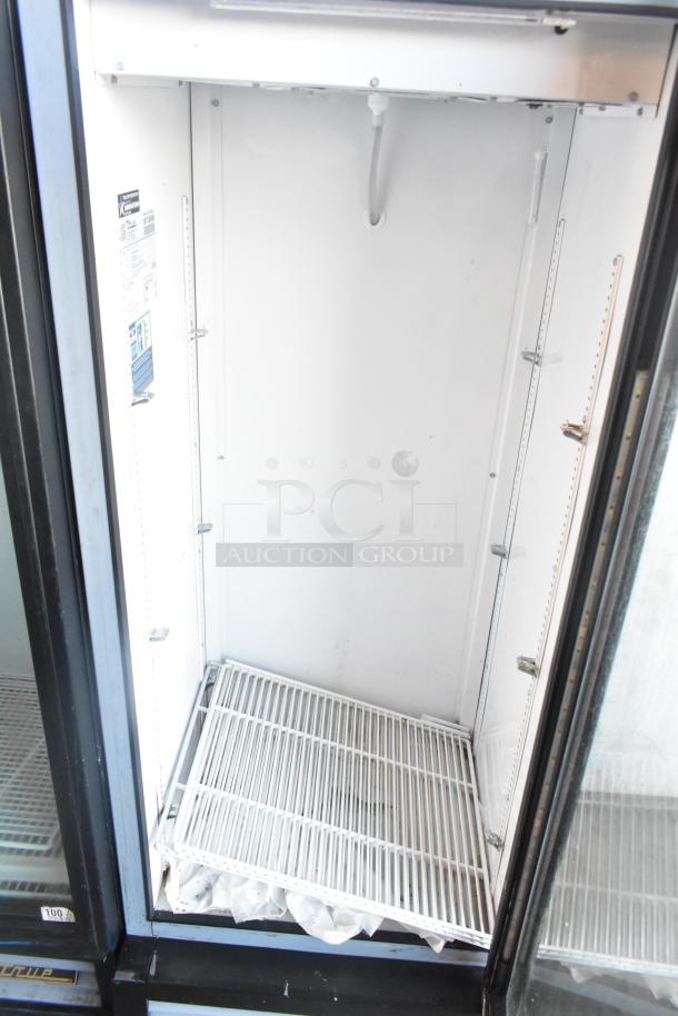 2021 True GDM-12-HC metal commercial single door reach-in cooler, 115 volts, 1 phase, in clean condition, interior view.