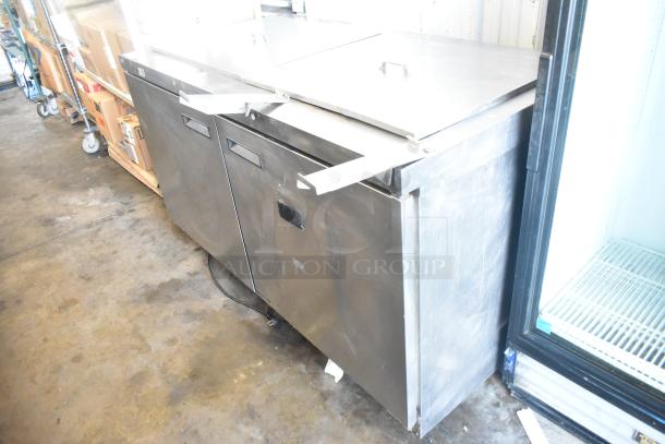 Delfield 4460N-24M-QZN stainless steel commercial prep table, 115V, 1 phase, with storage doors and stainless surface.