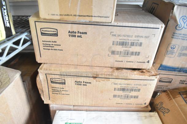 Boxes of Rubbermaid Auto Foam 1100 mL refills, showing labels with SKU FG750112 and batch details, stacked in tiered lot.