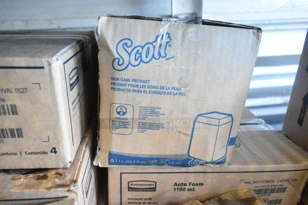 Tier lot of various items, including Rubbermaid Auto Foam 1100mL refills and Scott skin care products in boxes.