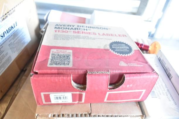 Tier lot with Avery Dennison Monarch labeler box, Aqua Sparkle detergent, Rubbermaid auto foam refills, and Dymo label printer.