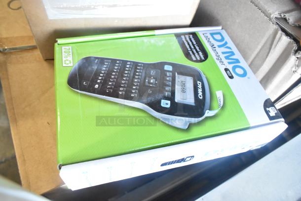 Tier lot of items including a Dymo LabelManager 160 label printer in box, Rubbermaid Auto Foam refills, Aqua Sparkle detergent.