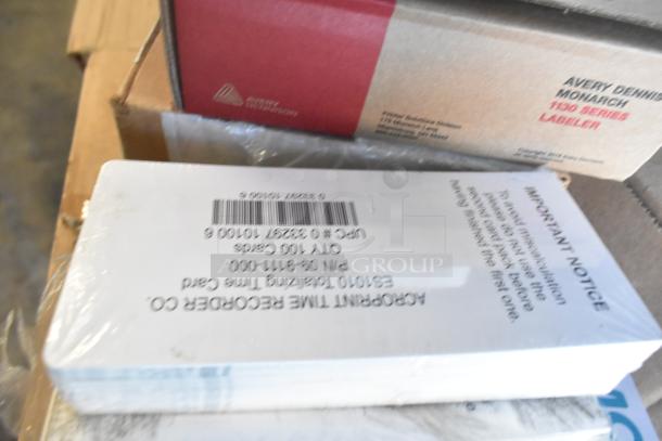 Tiered lot including Avery Dennison labels, time cards, and other packaged office supplies in good condition.
