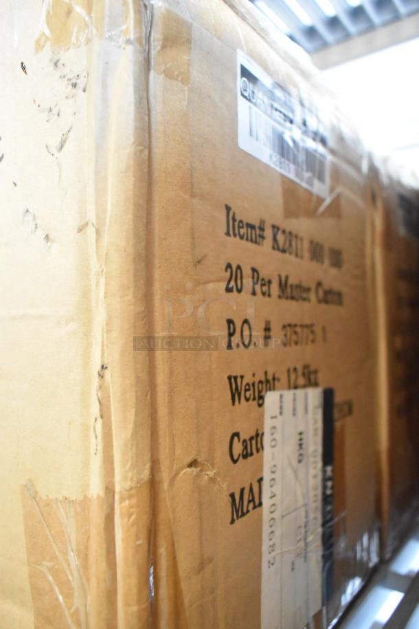 Cardboard box labeled "Item# K2811 000 000," containing Betco Emulsinator Stripper, visible weight 12.5kg, sealed condition.