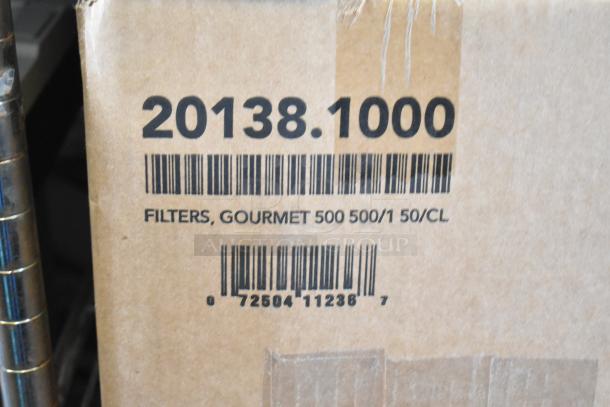 Two-tier box lot with Coastwide Glass Cleaner, filters marked "Gourmet 500 500/1 50/CL," and Coastwide pH Neutral Floor Cleaner.