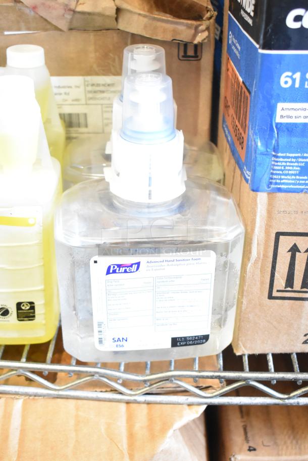 Two-tier lot with Coastwide glass cleaner, filters, and pH neutral floor cleaner. Includes Purell hand sanitizer, labeled with use details.