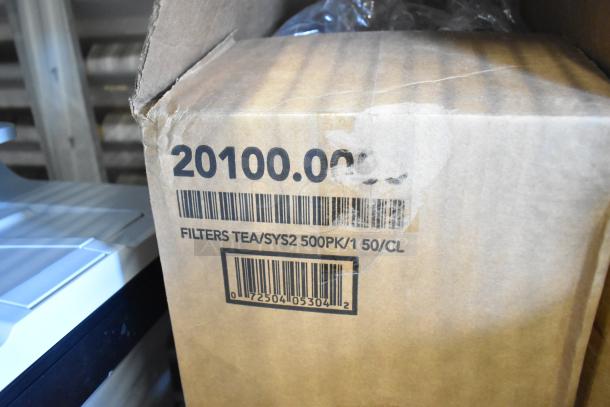Two-tier lot with Coastwide glass cleaner, filters, and pH neutral floor cleaner in a box labeled "20100.00, Filters TEA/SYS2 500PK/1 50/CL".