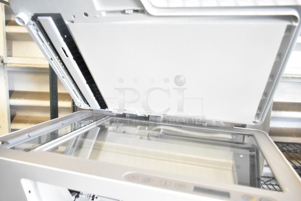 HP DeskJet 4255e printer with scanner lid open, showing glass scan bed. Excellent condition, multifunction device for home use.