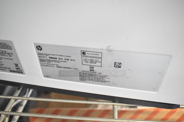 2025 HP Countertop Printer, 110-127V, 1 Phase. Includes HP Radio module SNPRC-1950. Compliance markings visible.